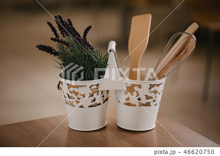 Kitchen accessories in the style of Provence. Devices for cooking from natural wood. Lavender in a Kitchen accessories in the style of Provence. Devices for cooking from natural wood. Lavender in a 46620750