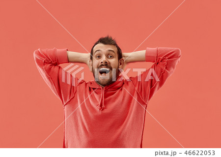 Winning success man happy ecstatic celebrating being a winner. Dynamic energetic image of male model Winning success man happy ecstatic celebrating being a winner. Dynamic energetic image of male model 46622053