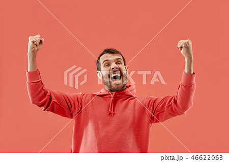 Winning success man happy ecstatic celebrating being a winner. Dynamic energetic image of male model 46622063