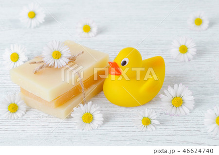 handmade natural soap with chamomile flowers and a duck toy handmade natural soap with chamomile flowers and a duck toy 46624740