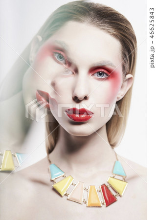 Sexy nude lady in colorful neacklace and artistic makeup Sexy nude lady in colorful neacklace and artistic makeup 46625843
