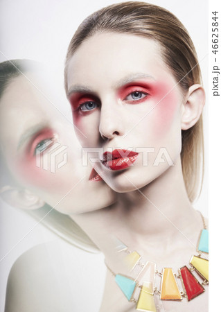 Sexy nude lady in colorful neacklace and artistic makeup Sexy nude lady in colorful neacklace and artistic makeup 46625844