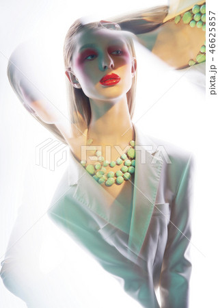 Sexy lady in colorful neacklace and white jacket 46625857