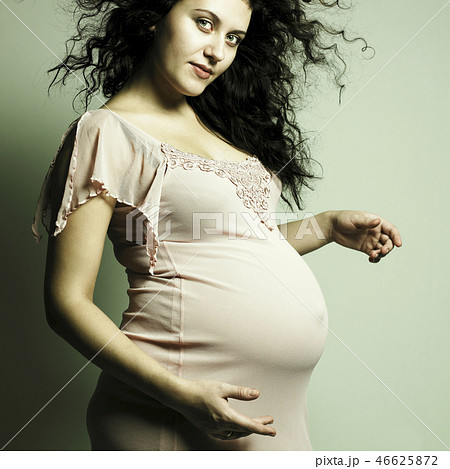 Young pregnant woman 46625872