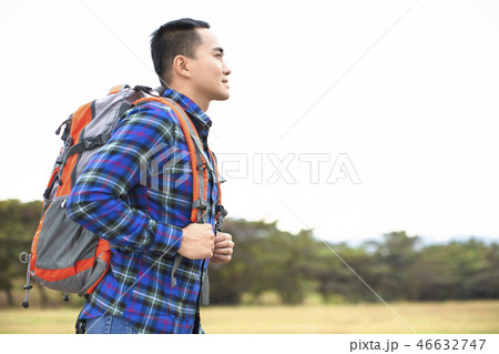 Traveler young Man with backpack looking forward Traveler young Man with backpack looking forward 46632747