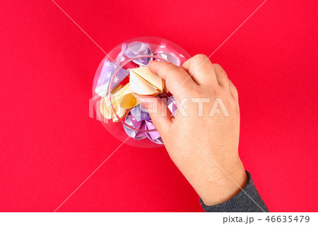 Diy cookie with predictions on a red background. Diy cookie with predictions on a red background. 46635479