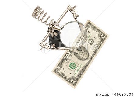 Dollars through a magnifying glass Dollars through a magnifying glass 46635904