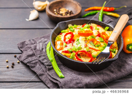 Traditional fritatta with peppers and potatoes 46636968