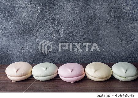 Large round marshmallows of different colors  46643048