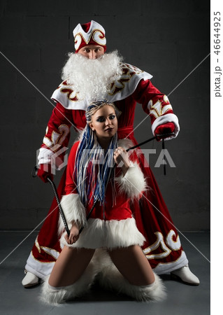 Santa Claus and Snow Maiden tied on a leash 46644925