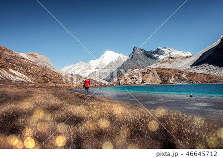Tourist backpacker hiking on peak at Milk lake 46645712