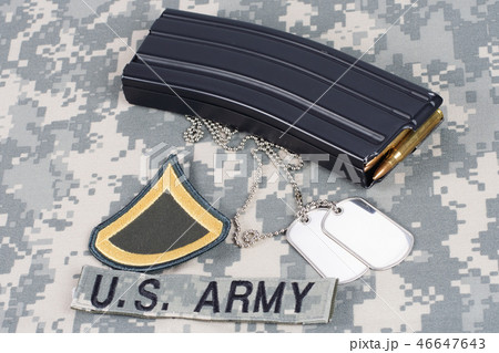 Ammunition on camouflage US Army uniform 46647643