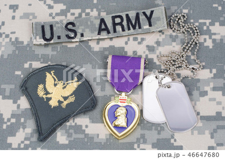 Purple Heart award on camouflage uniform 46647680