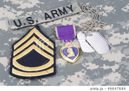 Purple Heart award on camouflage uniform 46647684