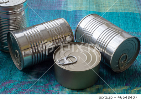 Tin cans with food. Conserved food. Tin cans with food. Conserved food. 46648407