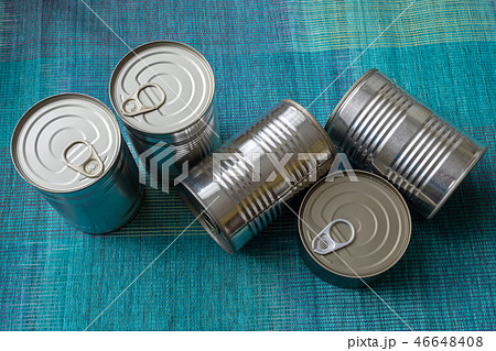 Tin cans with food. Conserved food. Tin cans with food. Conserved food. 46648408