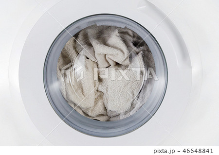 white clothes wash, closed washing machine with towel closeup 46648841