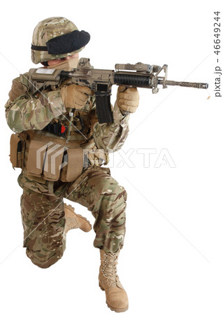 soldier with assault rifle on white background 46649244