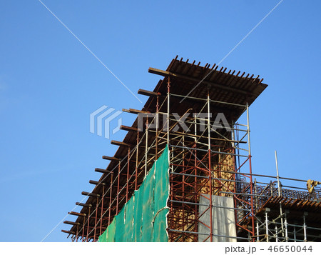Metal scaffolding at the construction site  46650044