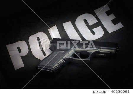 Police weapon and equipment on black uniform Police weapon and equipment on black uniform 46650061