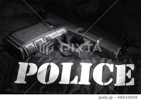 Police weapon and equipment on black uniform Police weapon and equipment on black uniform 46650099
