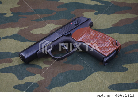 9mm russian handgun on russian camouflage uniform 9mm russian handgun on russian camouflage uniform 46651213