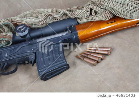 SVD sniper rifle on khaki canvas background SVD sniper rifle on khaki canvas background 46651403