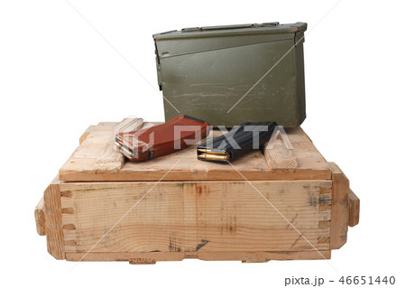 m16 and ak47 magazins on wooden box 46651440