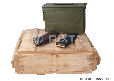m16 and ak47 magazins on wooden box m16 and ak47 magazins on wooden box 46651441