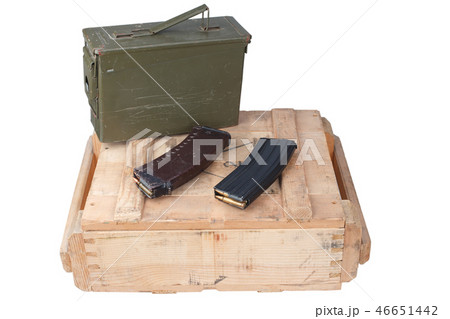 m16 and ak47 magazins on wooden box m16 and ak47 magazins on wooden box 46651442