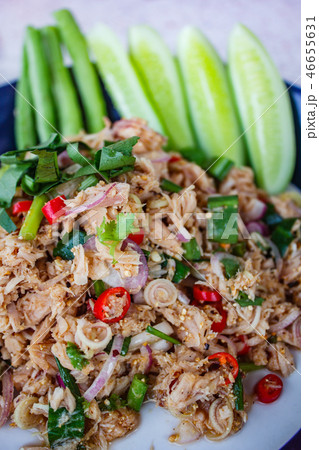 Tuna spicy salad with herbs, Thai style. Tuna spicy salad with herbs, Thai style. 46655631
