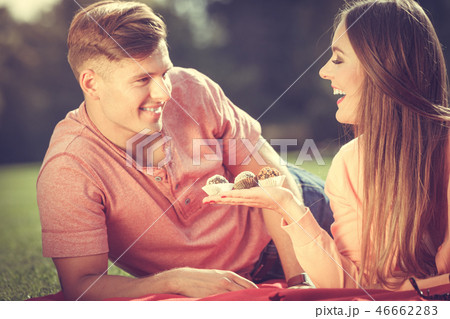 Couple on picnic date outdoor. Couple on picnic date outdoor. 46662283