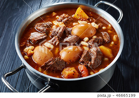 close-up of Traditional Jewish Cholent in a pan close-up of Traditional Jewish Cholent in a pan 46665199