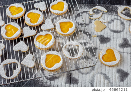 overhead of homemade Heart shaped linzer cookies overhead of homemade Heart shaped linzer cookies 46665211