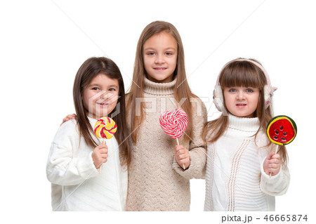 portrait of cute little kids in stylish clothes looking at camera and smiling portrait of cute little kids in stylish clothes looking at camera and smiling 46665874