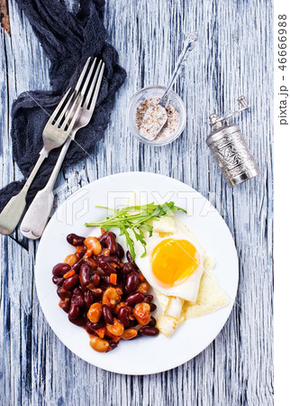 fried bean with fried eggs 46666988