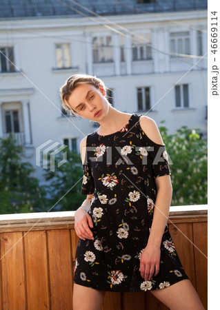 beautiful fashionable woman in a dress with flowers style blonde 46669114