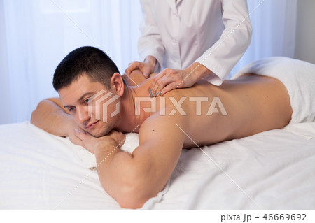 a massage therapist makes therapeutic massage Spa a massage therapist makes therapeutic massage Spa 46669692