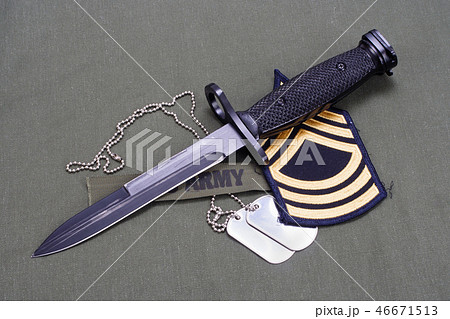 bayonet and dog tags on US ARMY uniform bayonet and dog tags on US ARMY uniform 46671513