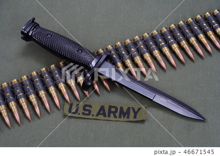 bayonet and ammunition belt on US ARMY uniform 46671545
