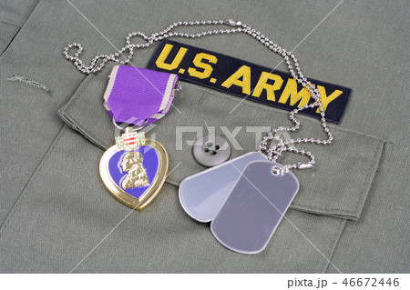 Purple Heart award on US ARMY olive green uniform 46672446