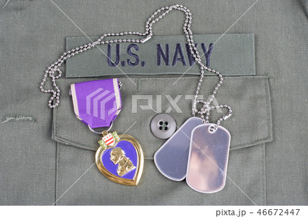 Purple Heart award on US NAVY olive green uniform Purple Heart award on US NAVY olive green uniform 46672447