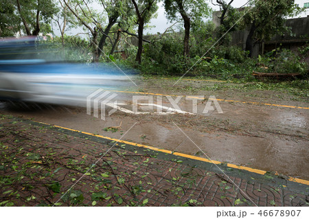 electric taxi driving on road after super typhoon electric taxi driving on road after super typhoon 46678907