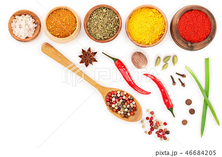 mix of spices in wooden spoon isolated on a white background with copy space for your text. Top view mix of spices in wooden spoon isolated on a white background with copy space for your text. Top view 46684205