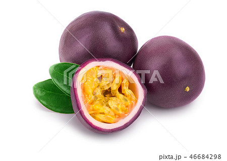Two whole passion fruits and a half with leaves isolated on white background. Isolated maracuya 46684298