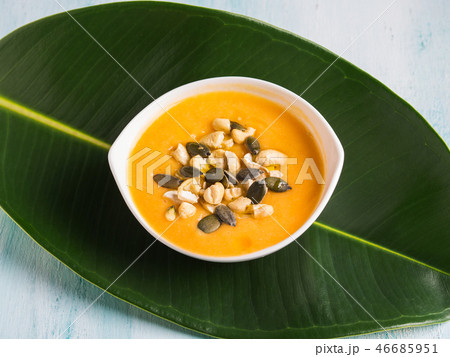 Bean squash creamy soup served with seeds and nuts 46685951
