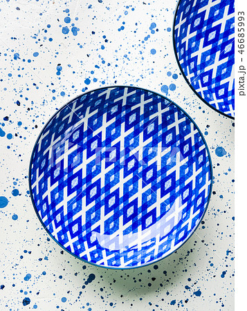 Empty porcelain china dish on white background Empty porcelain china dish on white background 46685993