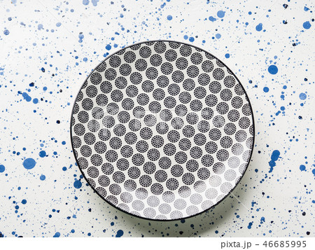 Empty porcelain china dish on white background Empty porcelain china dish on white background 46685995