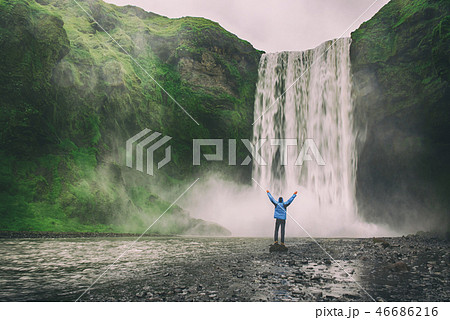 Man near waterfall Man near waterfall 46686216