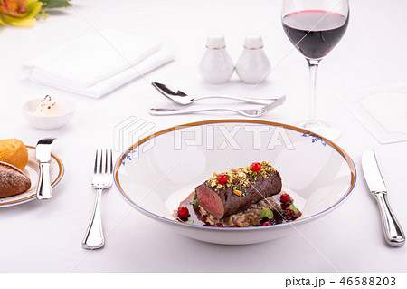 A meat stake on a pillow from porridge with berry A meat stake on a pillow from porridge with berry 46688203